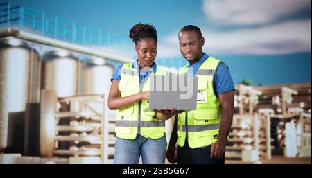 Silo Industrial Facility Managers At Work. Safety Inspector Stock Photo
