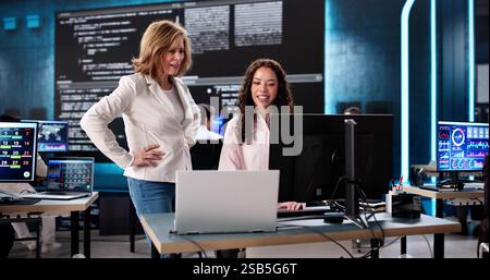 Developing Software Together: Diverse Programmers in Classroom Meeting for Projects Stock Photo