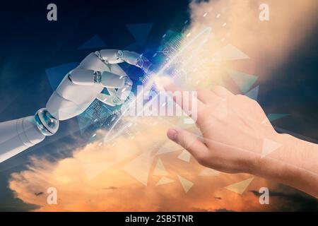 Man and robot touching data network against sunset sky, closeup of hands. Concept of collaboration between AI and human. Modern technology Stock Photo