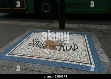 Dublin, Ireland - 22nd January 2025 - a mosaic for the Stag's Head pub located on a footpath on Dame Street in Dublin city centre Stock Photo