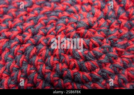 Knitted with a crochet hook, spiral shaped pattern texture, abstract   backdrop Stock Photo