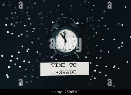 Black and white photo of a clock with the words Time to Upgrade written below it Stock Photo