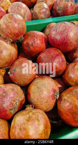 Group of pomegranates closeup, selective focus Stock Photo - Alamy