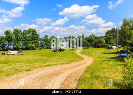 Road To Camping Site At Lake Mokre Near Zgon Village On Summer Sunny Road To Camping Site At Lake Mokre Near Zgon Village On Summer Sunny