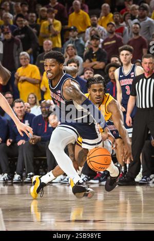 Arizona guard Caleb Love (1) against Texas Tech guard Chance McMillian