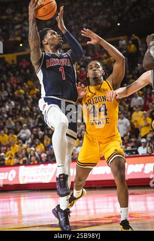 Arizona guard Caleb Love (1) against Texas Tech during a NCAA college