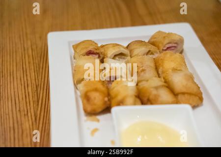 Fried spring roll served on plate, Thai food. Stock Photo