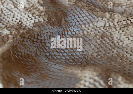 Honeycomb environmental friendly paper hexagonal shape made of cardboard recycled craft brown paper for protective packaging. Stock Photo