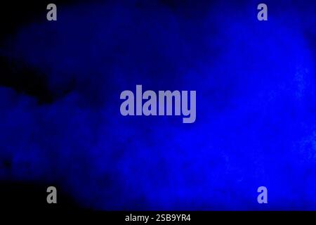 Blue cloud of smoke is floating in the air Stock Photo