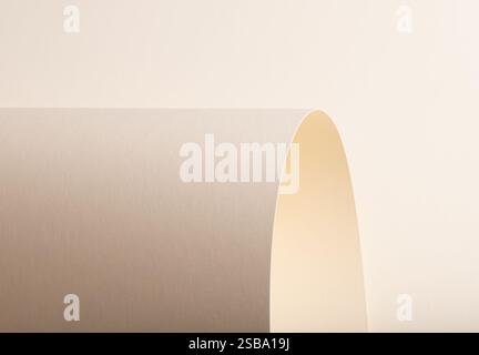 A beige paper background with a soft, smooth texture and a refined matte finish. The uniform, understated gradient creates a timeless and elegant aest Stock Photo