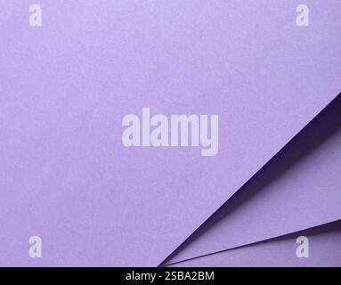 Lavender paper background with a smooth matte surface and soft lilac tones. Subtle and serene, it embodies a refined, elegant, and minimalist design w Stock Photo