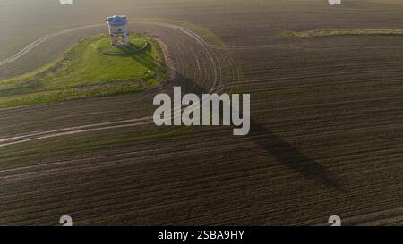 The sun rises behind Chesterton windmill in Warwickshire. Picture date: Sunday February 2, 2025. Stock Photo