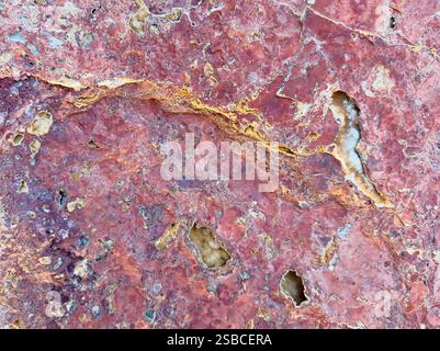 Layers and textures of red rock. Close up. Stock Photo
