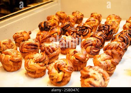 Assortment of different types of braided bread, Babka on display of a cake shop Stock Photo