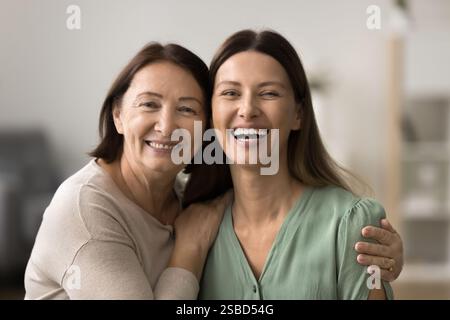 Close up portrait of happy elderly woman and her daughter Stock Photo