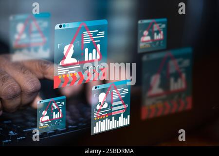 Developer man hand using laptop with triangle caution malware warning icon hologram. Scam virus spyware malware antivirus concept, cybersecurity, cybe Stock Photo