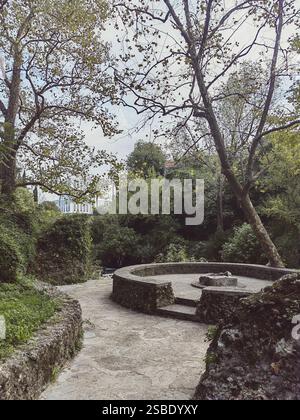 A historical site with stone buildings in the forest by the river in the capital of Montenegro, Podgorica Stock Photo