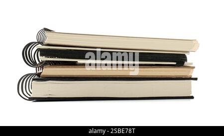 Stack of different notebooks isolated on white Stock Photo