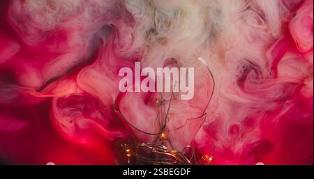 Bright fume. Paint smoke. Exploding red pink cloud ink into white art liquid mix veil background. Fluids texture broken glass garland lights. Stock Photo