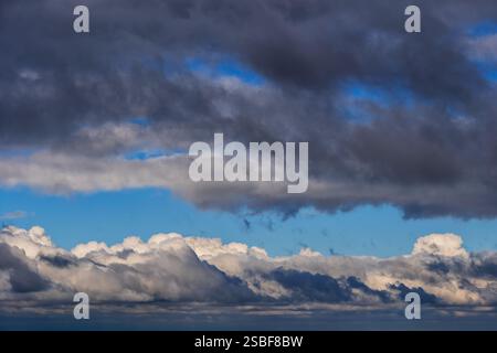 Dark and white clouds in the sky, cloudscape natural background. Stock Photo