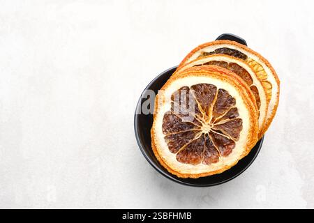 Dried orange slices on white background Stock Photo