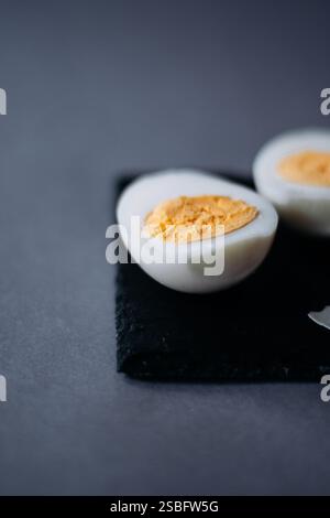 Boiled chicken egg cut in a half Stock Photo