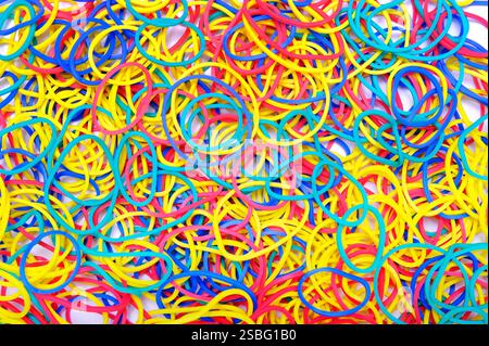 selection of colourful elastic bands background Stock Photo