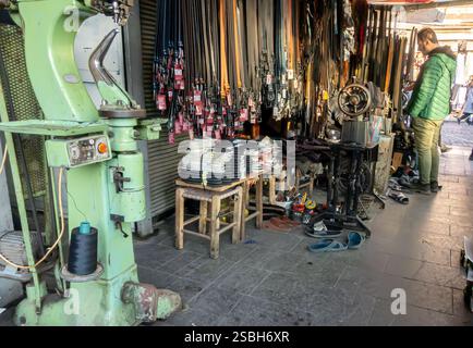 Belts, leather accessories store and workshop, machine, seller, Diyarbakir Turkey Turkiye Stock Photo