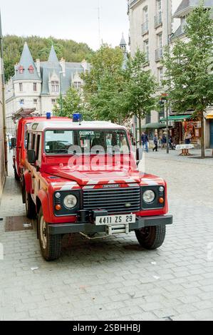 Red departmental fire and rescue service Land Rover Defender parked ...