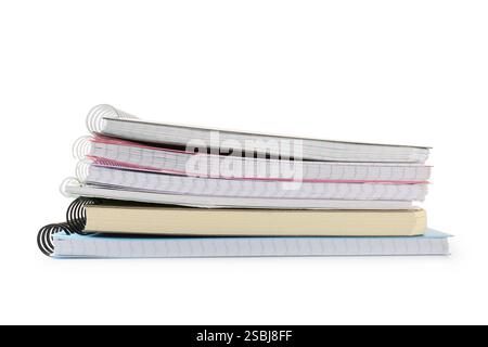Stack of different notebooks isolated on white Stock Photo