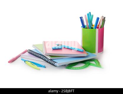 Doing homework. Notebooks and other different stationery on white background Stock Photo