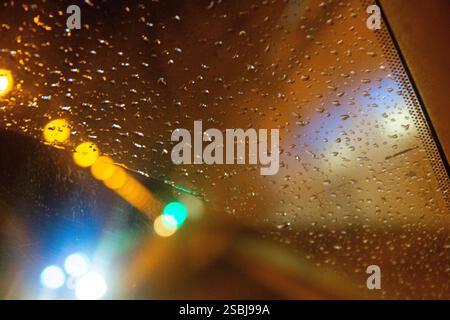 Abstract image of raindrops on a car window in a road tunnel, Madeira, Portugal Stock Photo