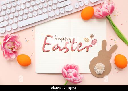 Beautiful greeting card for Happy Easter with computer keyboard Stock Photo