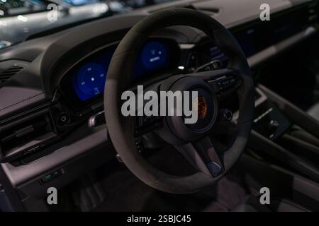interior, steering wheel electric Porsche Macan GTS car Interior, cockpit, instruments button switches, electric vehicle, modern interface, digital in Stock Photo