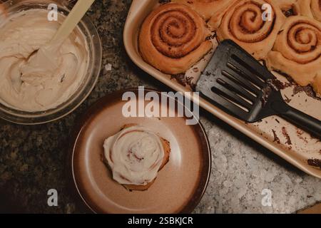 Freshly Baked Cinnamon Rolls with Cream Cheese Frosting Stock Photo