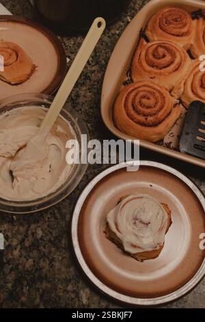 Freshly Baked Cinnamon Rolls with Icing Stock Photo