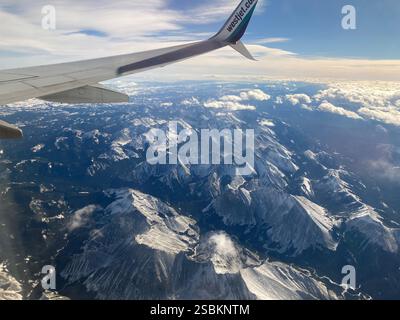 View over Canadian Rocky Mountains from a Westjet Boeing 737 Stock Photo
