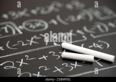 Mathematical operations and algebra mathematic formula written with ...