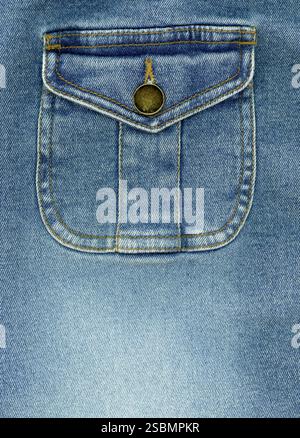 Blue stone washed denim pocket and metal button detail cotton fabric texture background Stock Photo