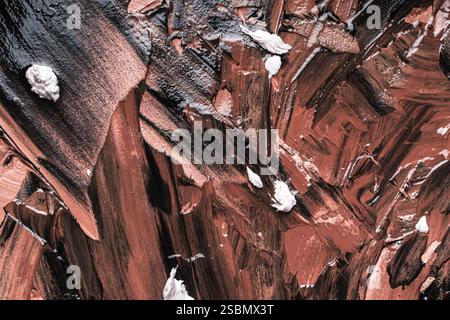 Abstract background with brown and beige plaster texture. Seamless background with large brushstrokes. Rough stylized texture with space for text. Hig Stock Photo