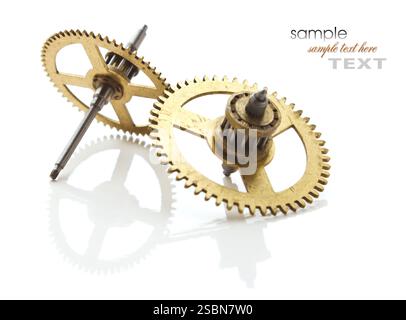 gears from old clock isolated on white background with reflection Stock Photo