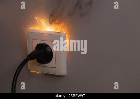 Electrical Short Circuit Causing Sparks and Fire Stock Photo