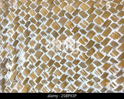 Close up of white clay ceramic with brown natural rattan texture. Rattan weaving seamless background. Stock Photo