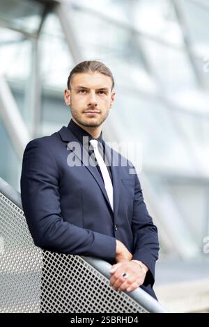 Handsome stylish young businessman posing portrait outdoor Stock Photo