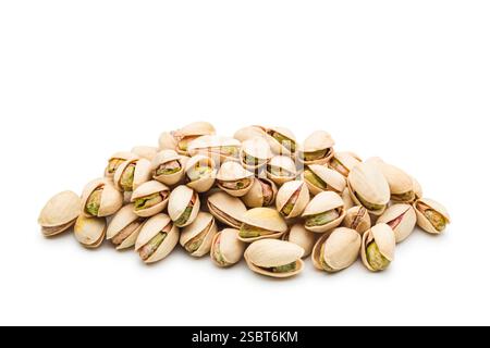 Pile of pistachios isolated on white background. Stock Photo