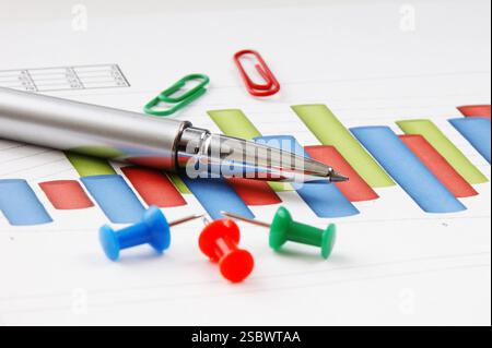 Graphs tables and documents laid on the table Stock Photo