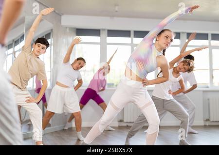 Group of children warming up before dance class Stock Photo