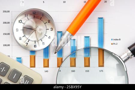 Graphs tables and documents laid on the table Stock Photo
