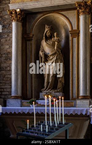 Candles burning in the Saint Just church, Eglise Saint-Just, Arbois, France Stock Photo