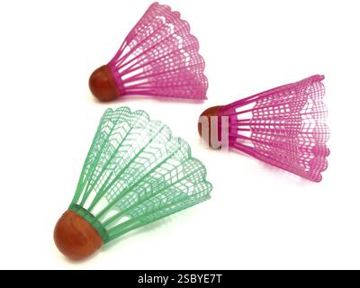 Photo of the multicolored shuttlecocks against the white background Stock Photo